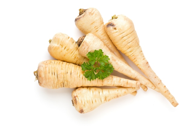 Top view of parsnip and parsley