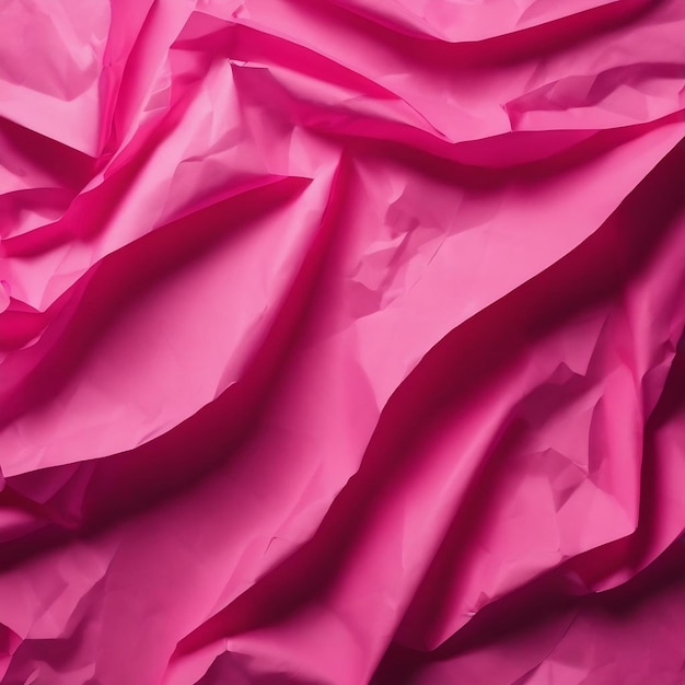 Top view of pink crumpled paper background