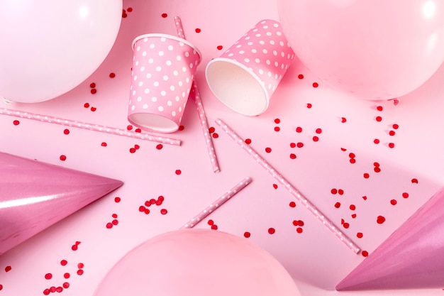 Top view pink decorations on table