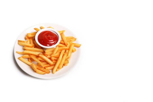 Top view a plate of crispy french fries with ketchup isolated on white background with copy space