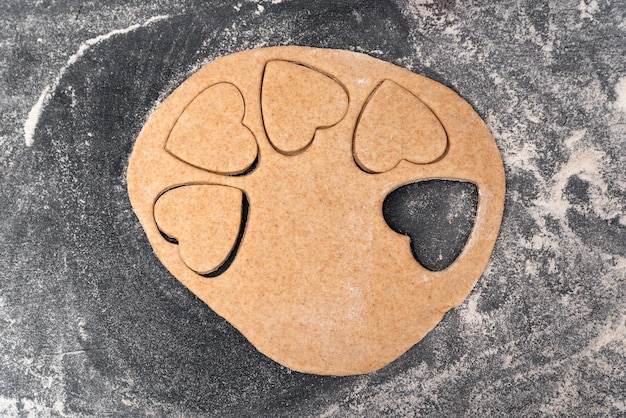 Top view of process of making shortbread herat shape cookies