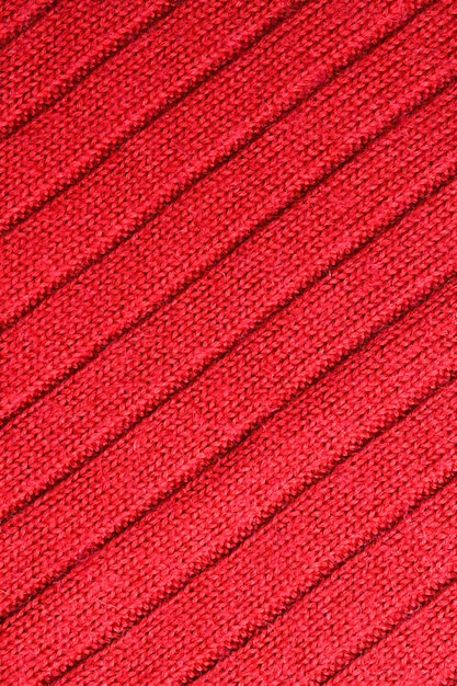 Top view red toned abstract textile texture background