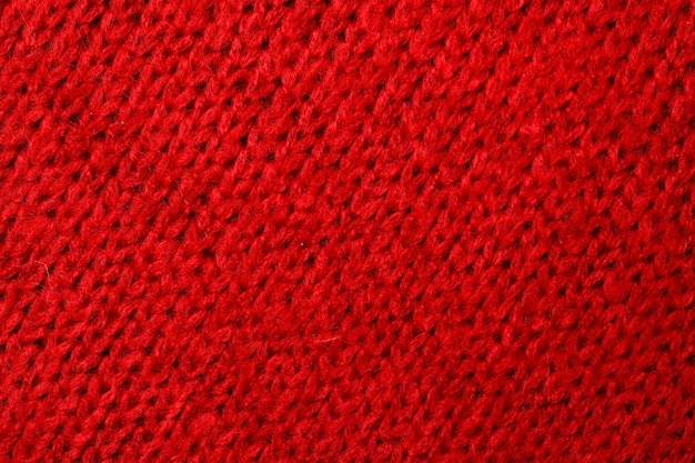 Top view red toned abstract textile texture background