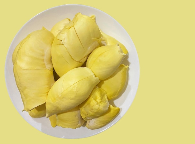 Top View of ripe durian on yellow background