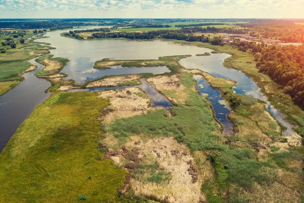 Top view of the river floodplain on a sunny summer day