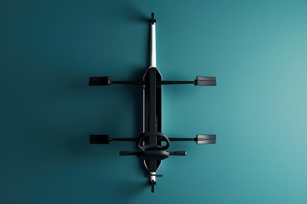 Photo a top view of a rowing machine against a teal wall showcasing its oars and controls