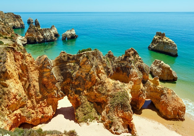 Top view on sandy beach Dos Tres IrmaosPortimao Alvor Algarve Portugal