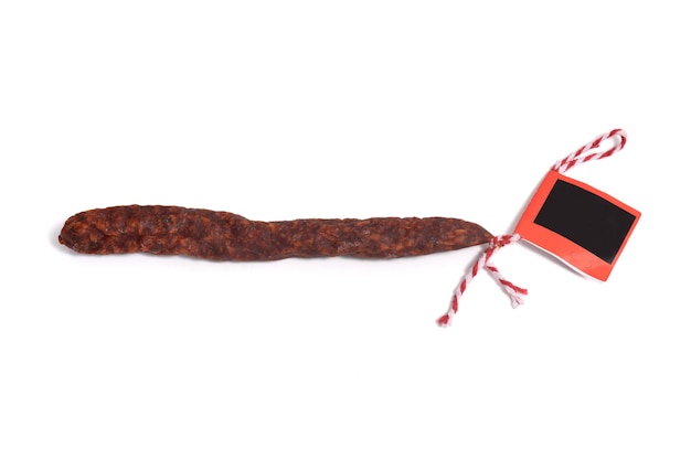 Top view of sausage chorizo picante isolated on whihe background