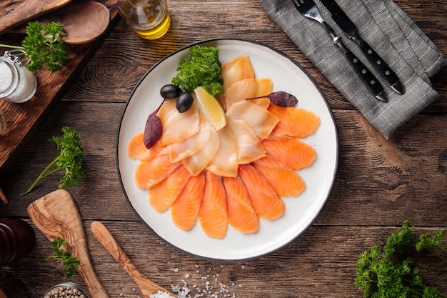 Top view on smoked fish platter appetizer