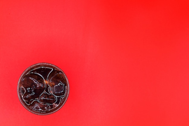 Top view of soft drink isolated on red background