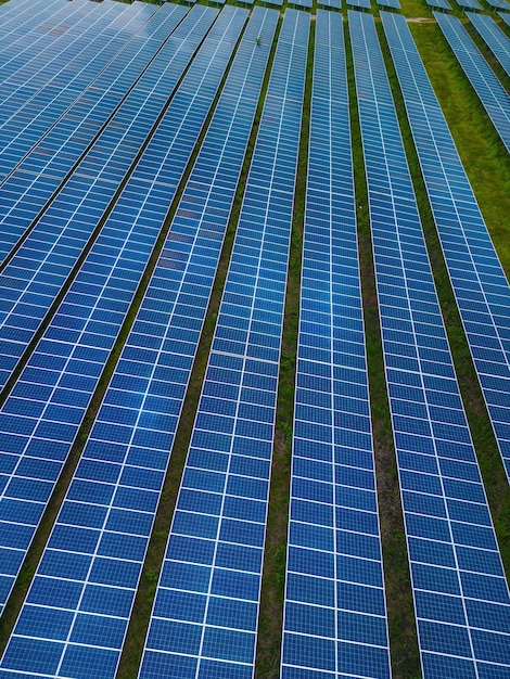 Top view of Solar panels on farm Alternative source of electricity solar panels absorb sunlight as a source of energy to generate electricity creating sustainable energy