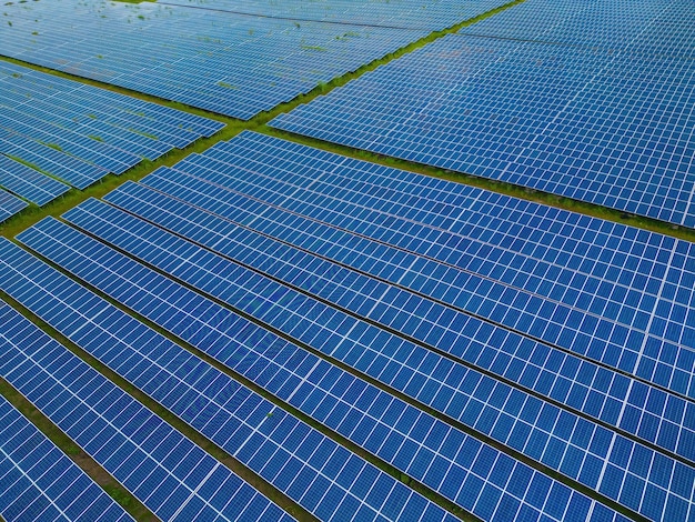 Top view of Solar panels on farm Alternative source of electricity solar panels absorb sunlight as a source of energy to generate electricity creating sustainable energy