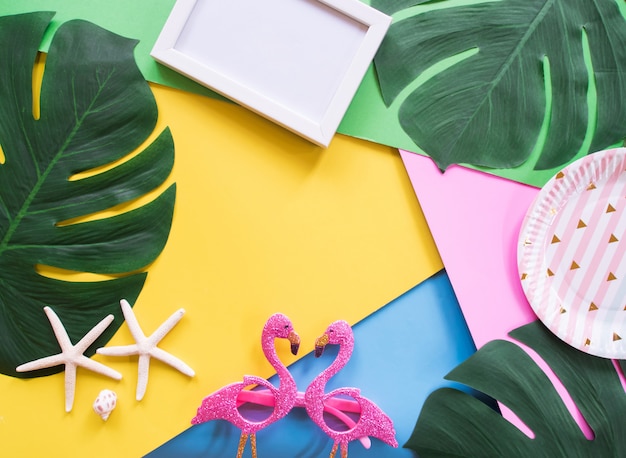 Top view of summer fashion frame and colorful background.