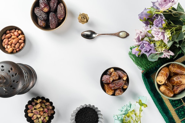 Top view table arrangement with dried dates fruit and apricot