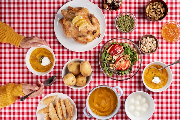 Photo top view on table full of various types of food