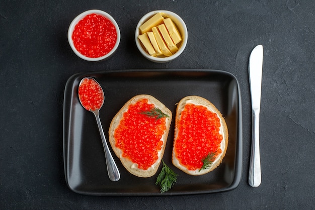 top view tasty caviar sandwiches inside plate.