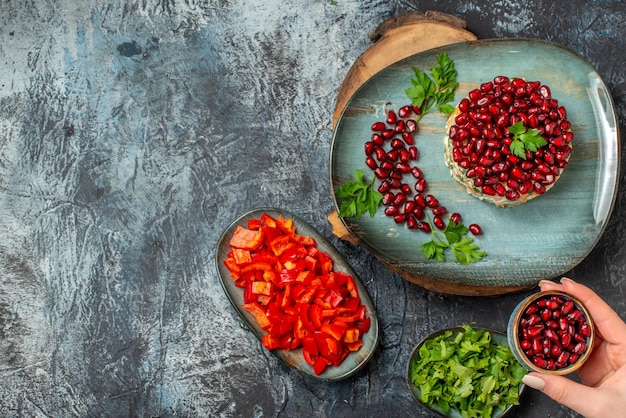 Top view tasty chicken salad with pomegranates on gray background bread salad food diet health fruit meal