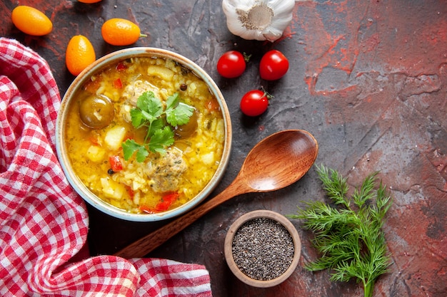 Top view tasty meat soup with potatoes and rice inside little plate on dark surface bread meal dinner dish kitchen restaurant food cuisine