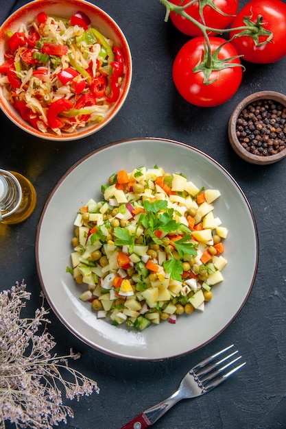 top view tasty vegetable salad with red tomatoes on dark surface diet bread food cuisine colour lunch meal horizontal health