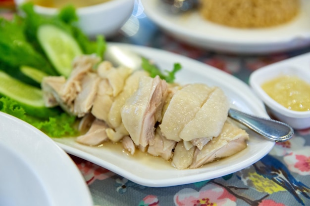 Top view of Thai food style Hainanese chicken rice or steamed chicken rice focus selective