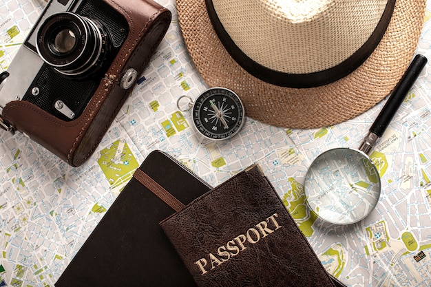 Top view travel set with passport and camera