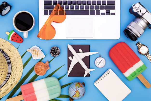 top view of Traveler's accessories, blue desk office