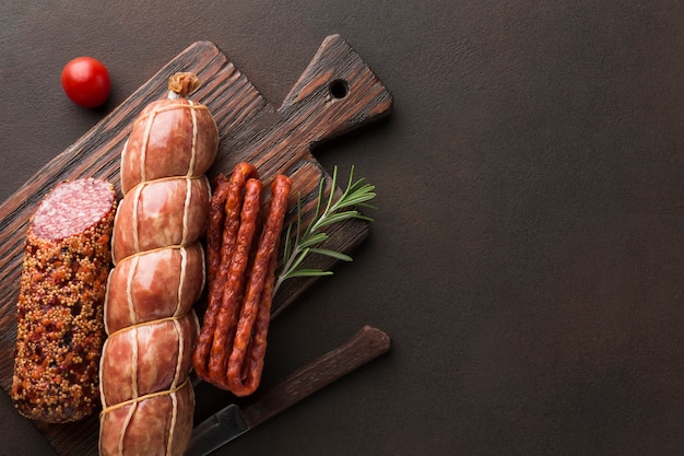 Top view variety of meat on the table with copy space