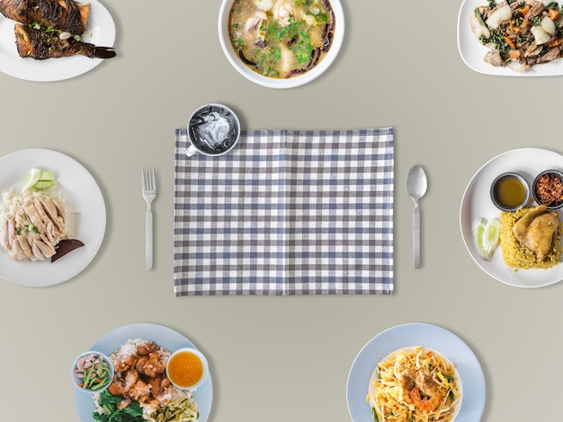 Top view of variety of Thai tradition dishes  on table with empty copyspace.