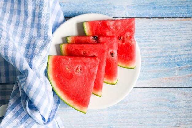 Top view watermelon slice on white plate background, Closeup sweet watermelon slices pieces fresh watermelon tropical summer fruit