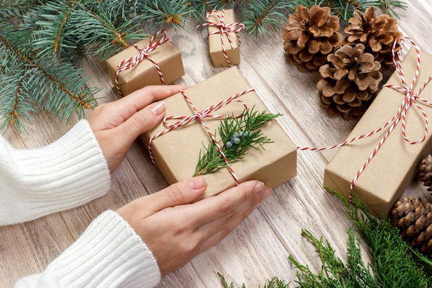 Top view of Woman preparing Christmas gift