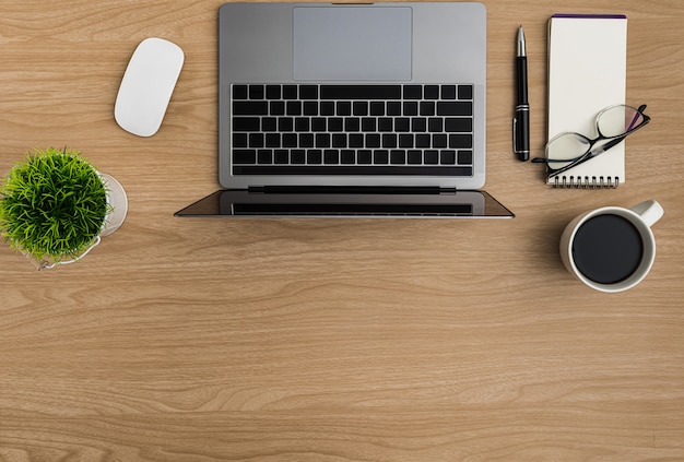 Top view Wood office desk table. Flat lay Workspace