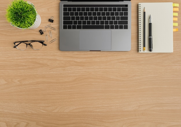 Top view Wood office desk table. Flat lay Workspace