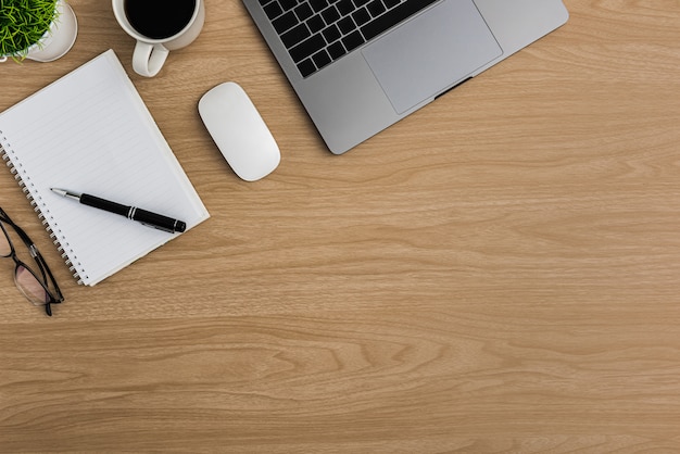 Top view Wood office desk table. Flat lay Workspace