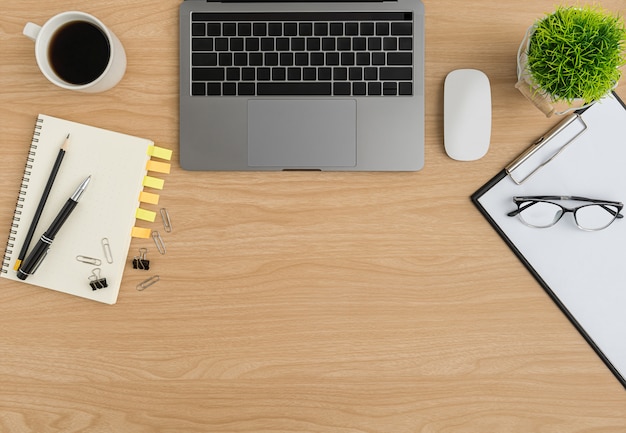 Top view Wood office desk table. Flat lay Workspace