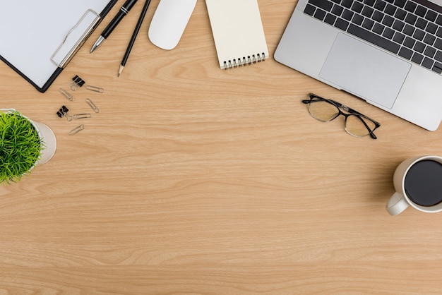 Top view Wood office desk table. Flat lay Workspace