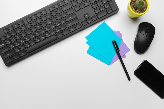 top view work space of an office worker with computer keyboard