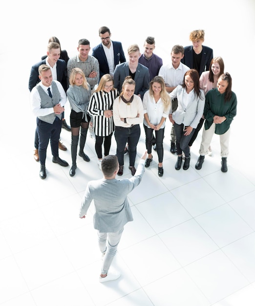 Top view young leader standing at the front of the business team