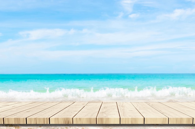 Top of wood balcony table with seascape and palm leaves sea and sky at beach