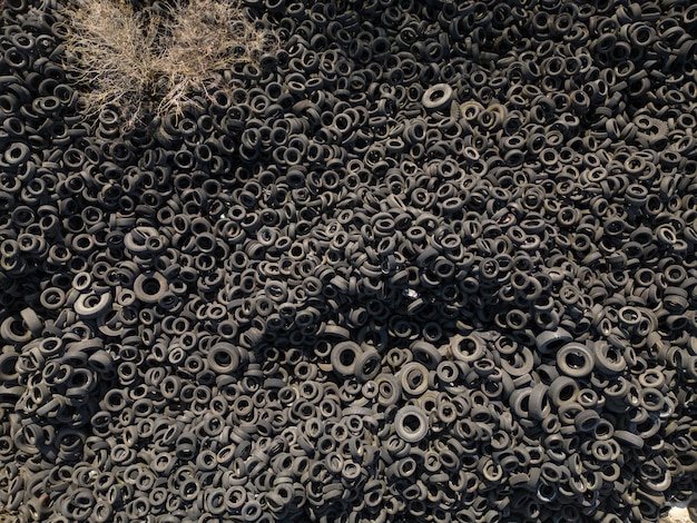 Topdown view of a massive dump of car tires