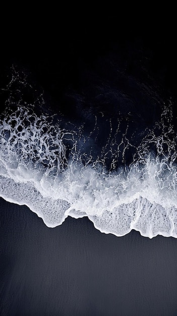 Photo a topdown view of the ocean against a dark night sky with a black background in a realistic