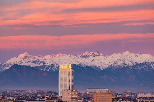 Torino (Turin, Italy): cityscape at sunrise woth the new skyscraper towering over the city.