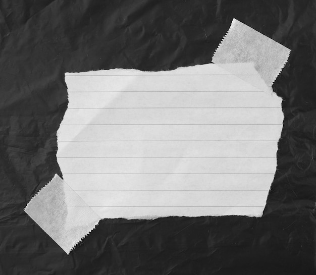 torn paper with adhesive tape space for your message