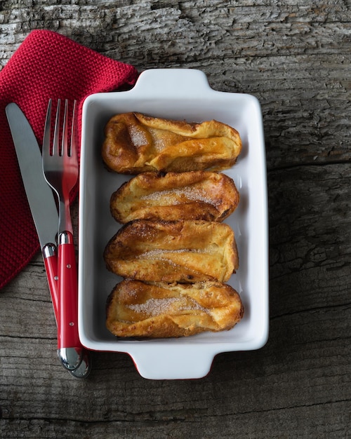 Torrijas Typical food of Spain at Easter Copy space Torrijas in white tray Top view