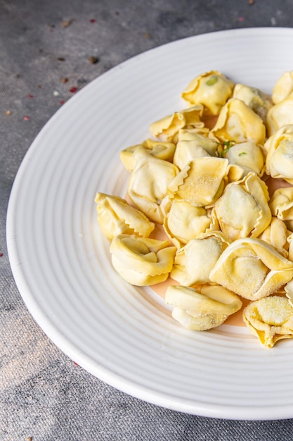 tortellini fish stuffed meal food snack on the table copy space food background vegetarian food