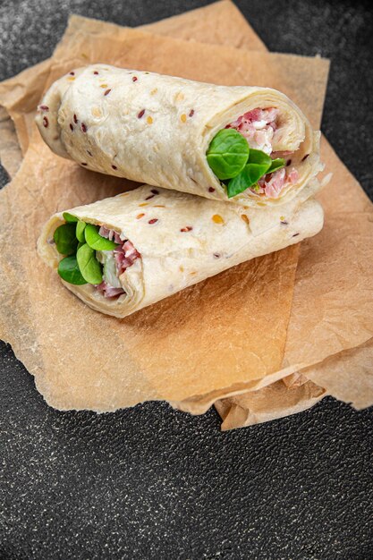 tortilla wrap ham vegetable cheese lettuce delicious fresh tasty healthy eating cooking appetizer meal food snack on the table copy space food