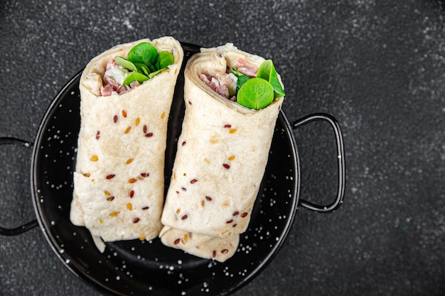 tortilla wrap ham vegetable cheese lettuce delicious fresh tasty healthy eating cooking appetizer meal food snack on the table copy space food