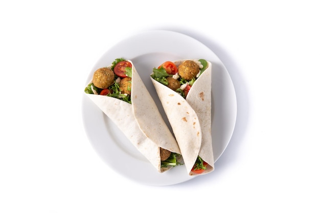 Tortilla wrap with falafel and vegetables isolated on white background