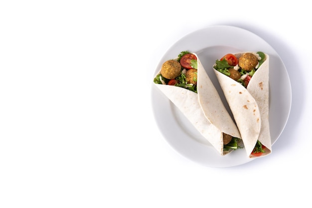 Tortilla wrap with falafel and vegetables isolated on white background