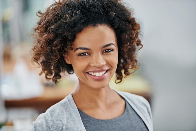 Total job satisfaction Portrait of a young businesswoman