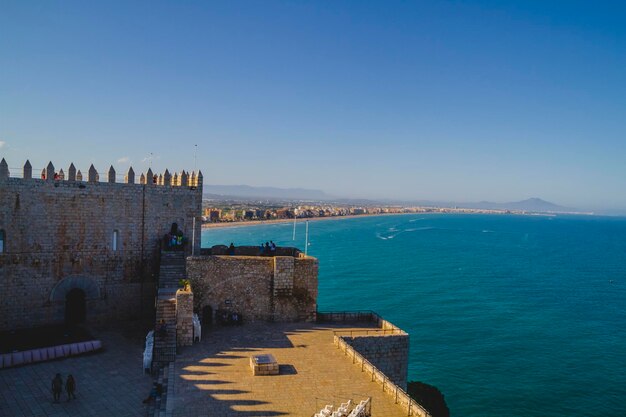 Tourism, spanish landscape with deep blue sea andmediterranean  architecture